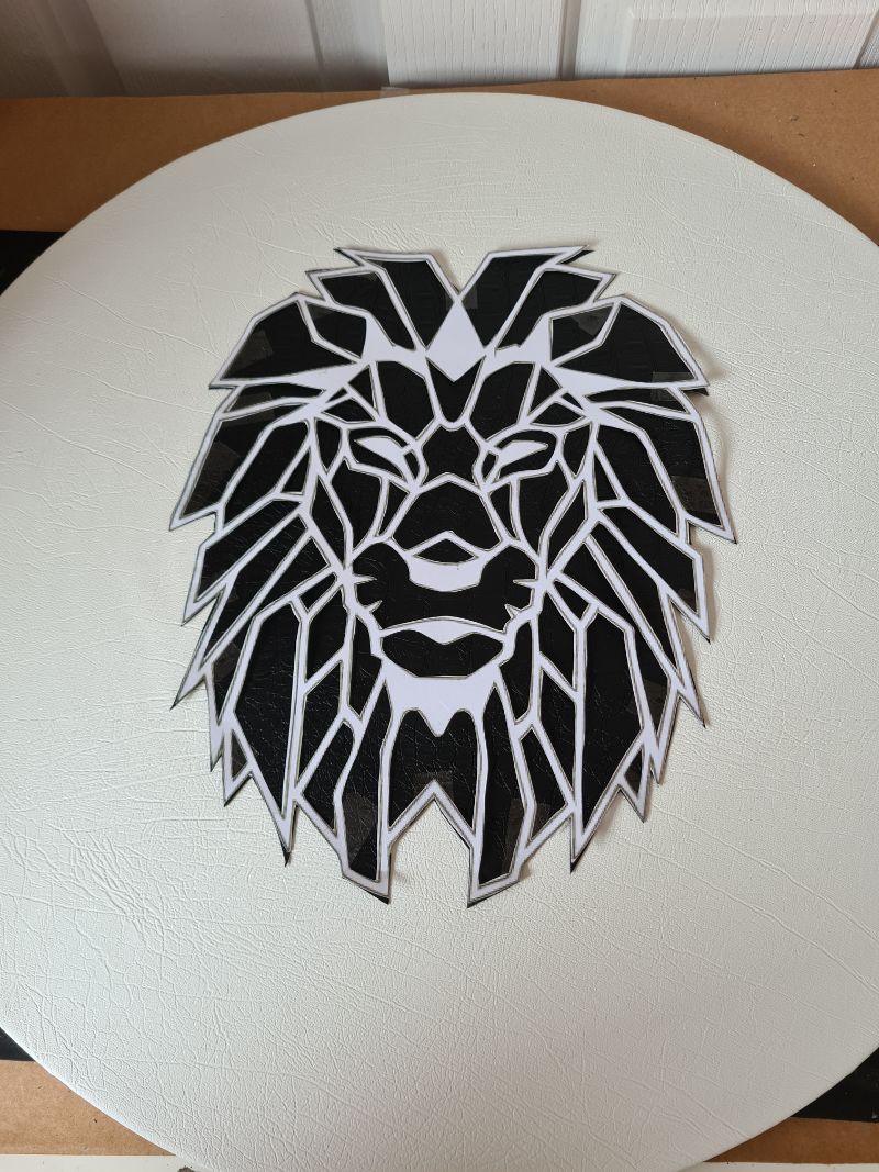 Geometric lion wall art made from scraps of leather