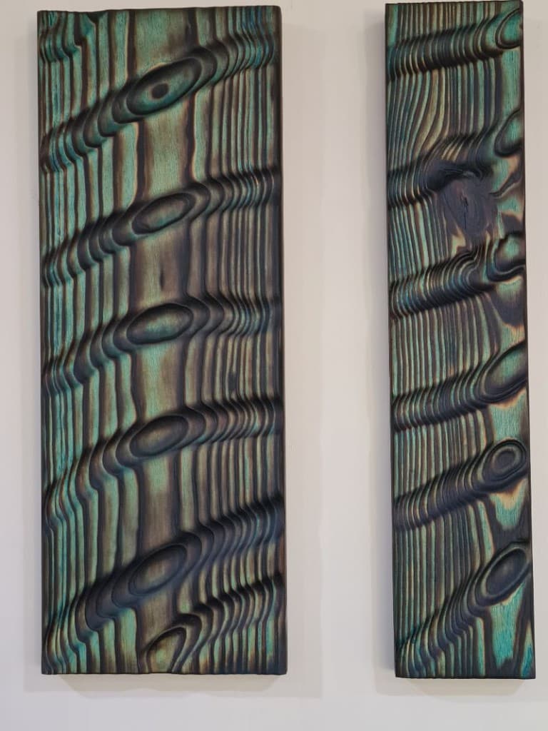 Sealed and finished panel with rich sheen and texture