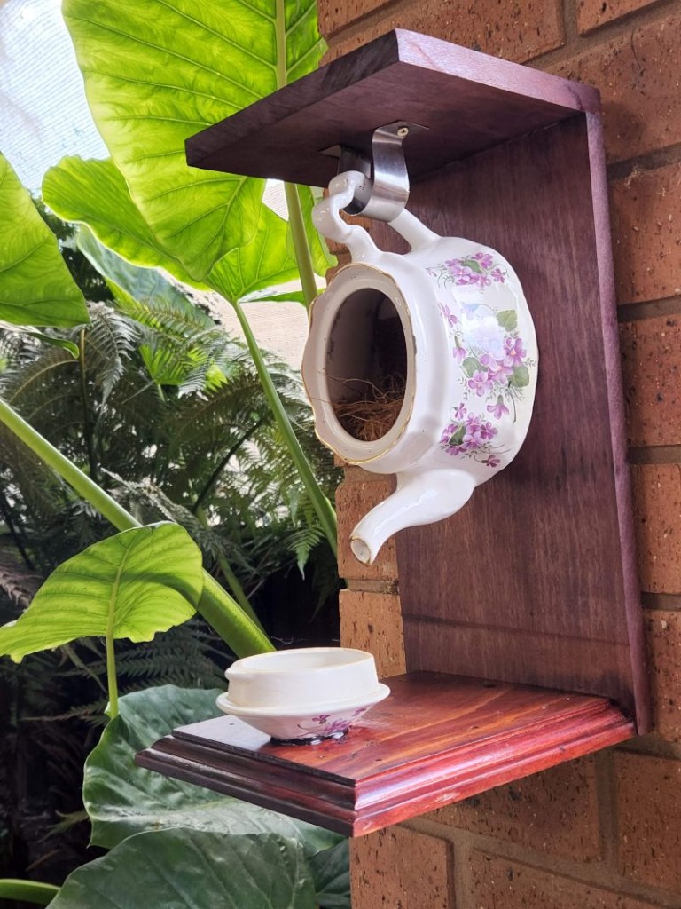 Birdhouse made from a recycled teapot