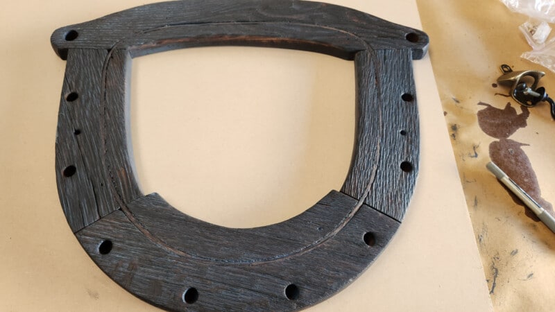 First coat of blue paint on chair frame