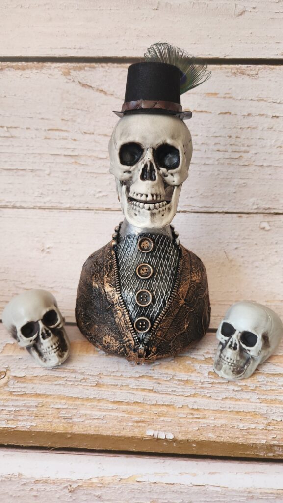 Halloween table bottle with skull decorated in mixed media art