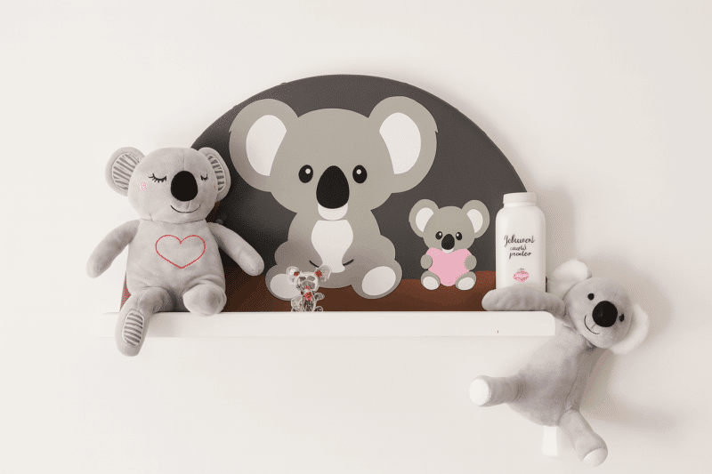 Koala themed nursery shelf with leather cut outs