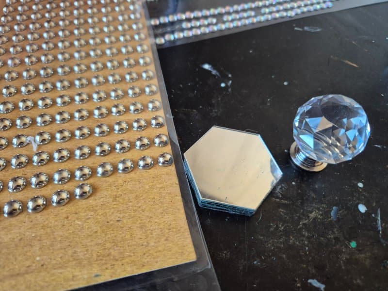 string beads and glass drawer pull