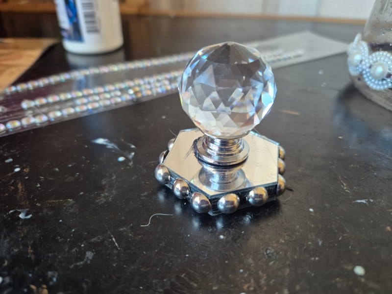 using glass drawer pull and mirrors to make steeple