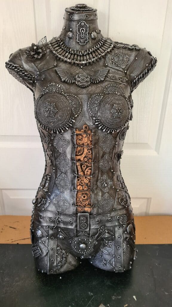 assemblage mannequin with silver applied