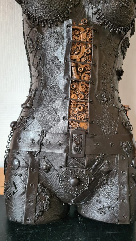 assemblage mannequin painted black
