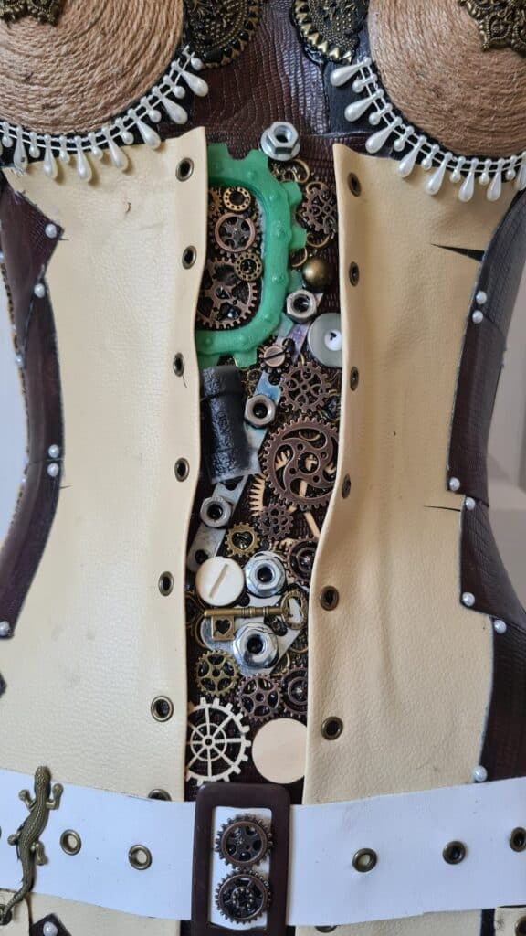 industrial charms inside corset area