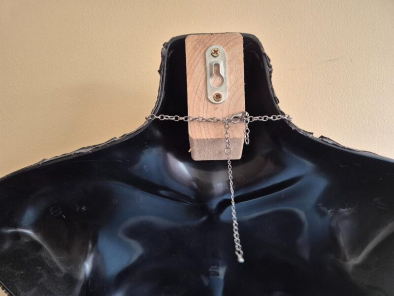 keyhole bracket for hanging the mannequin flush on the wall