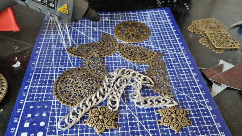 metal filagree decorative discs as embellishments