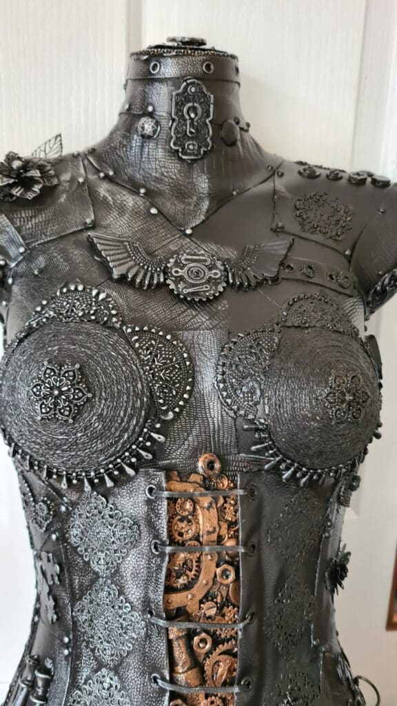 mannequin half way through adding wax