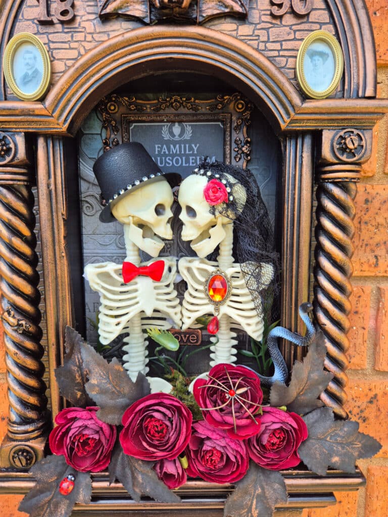 up close view of red flowers in mausoleum 