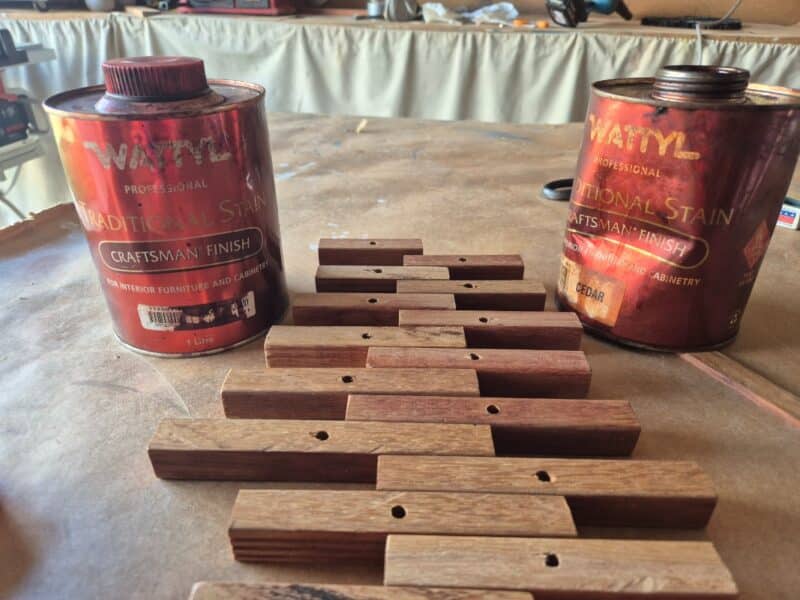 staining the wood on the wind spinner