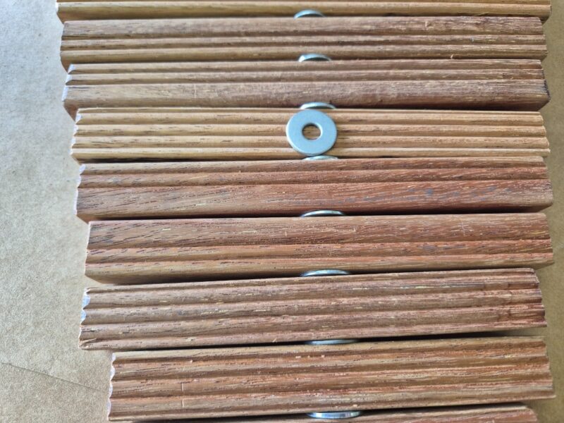 add washers between wood pieces