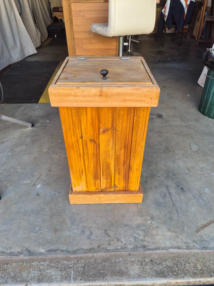 Wooden kitchen dustbin before 
makeover into planter